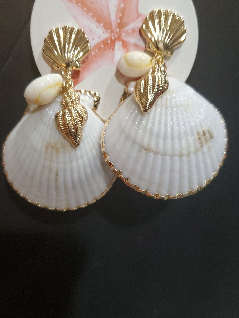Gold plated shell oversized white seashell cowrie snail shell adorned earrings